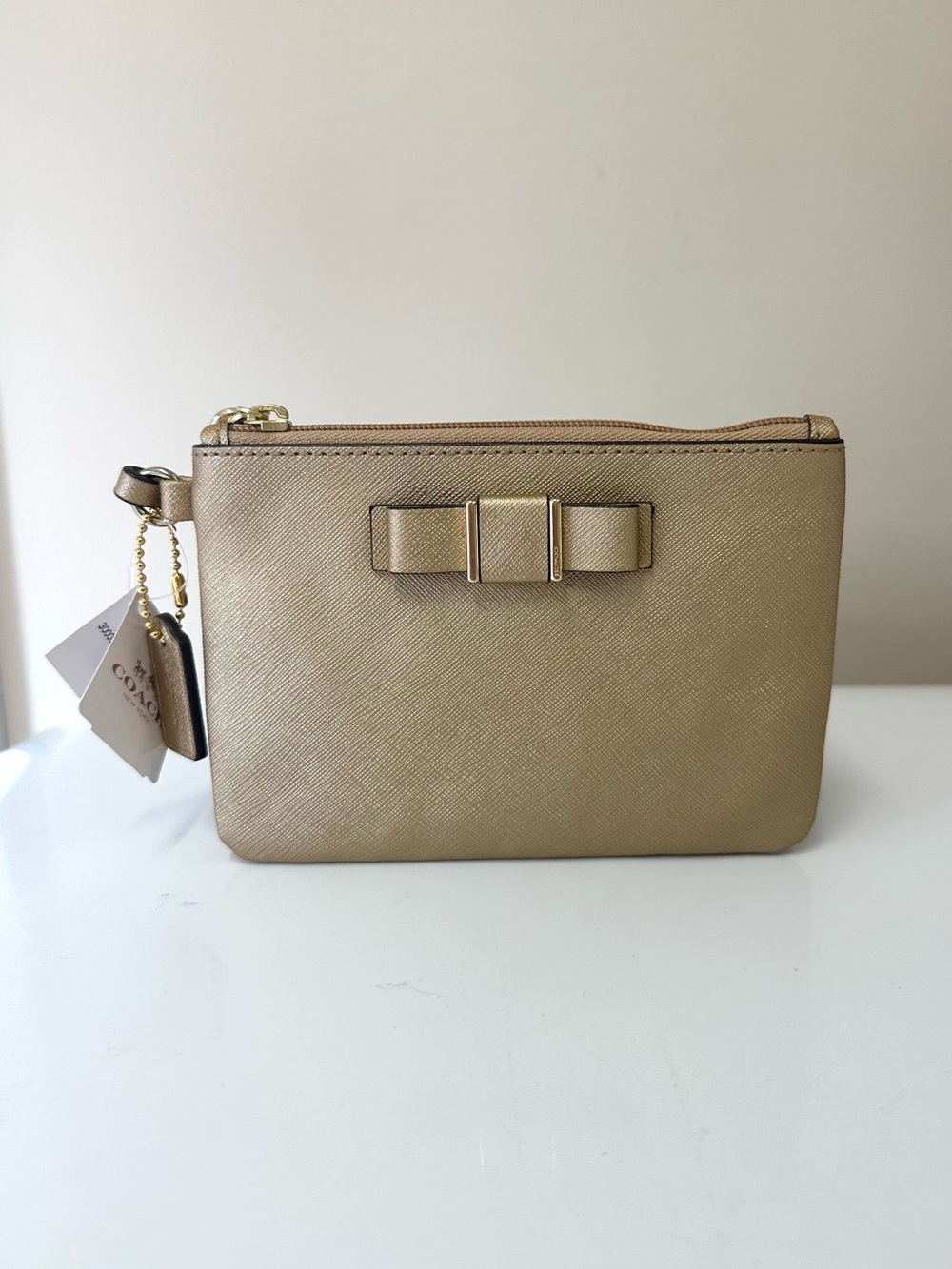 NWT Coach Gold Saffiano Leather Wristlet with Bow Accent
